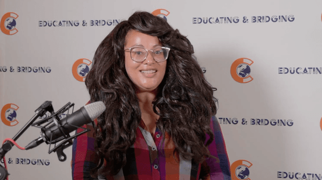 Podcast guest speaking into a microphone